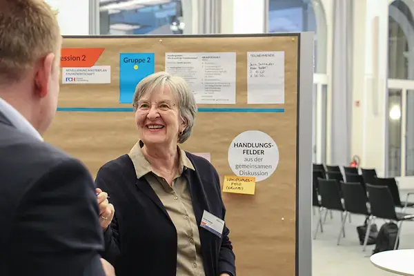 Participant in front of a display at the Master Plan kick-off event