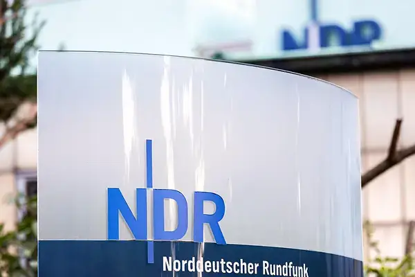 NDR display board in front of a broadcasting centre as a visual for School Meets Finance
